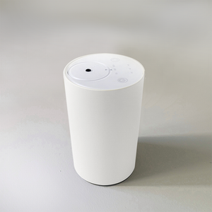 home scent system diffuser for 450 sq ft fragrance oil sold separately. bright white matte finish soft touch. top view