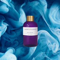 Purple bottle with gold cap on a blue and white smoke background, featuring 'Scent & Fluence' brand scent oil Holy Smokes.