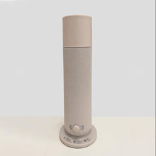 Load image into Gallery viewer, A tall cylindrical smart scent diffuser with a textured beige mesh body, a solid beige cap, and a matching round base, shown on a clean white surface against a light gray background.