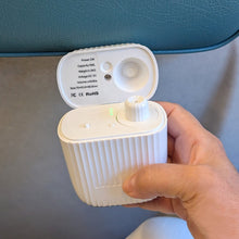 Load image into Gallery viewer, White scent diffuser held by a hand