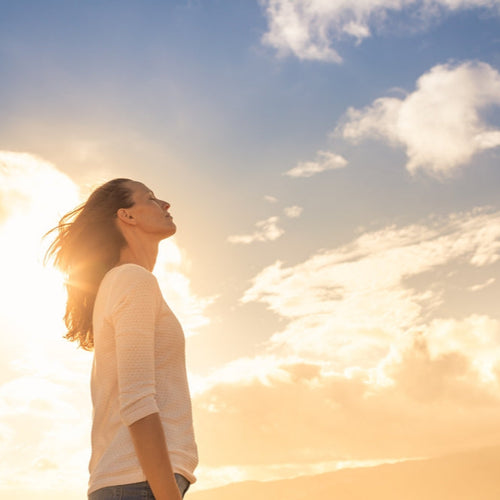 Woman looking to the sky | Empowerment | Hope's Door signature scent