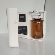 Load image into Gallery viewer, SMI Radiant scent diffuser in white with door open revealing lcd programming pad and refillable 500ml brown plastic bottle