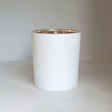 Load image into Gallery viewer, Child&#39;s Pose Yoga inspired 9oz soy candle by ScentFluence with cotton wick in a white frosted matte vessel and gold colored mirrored interior.